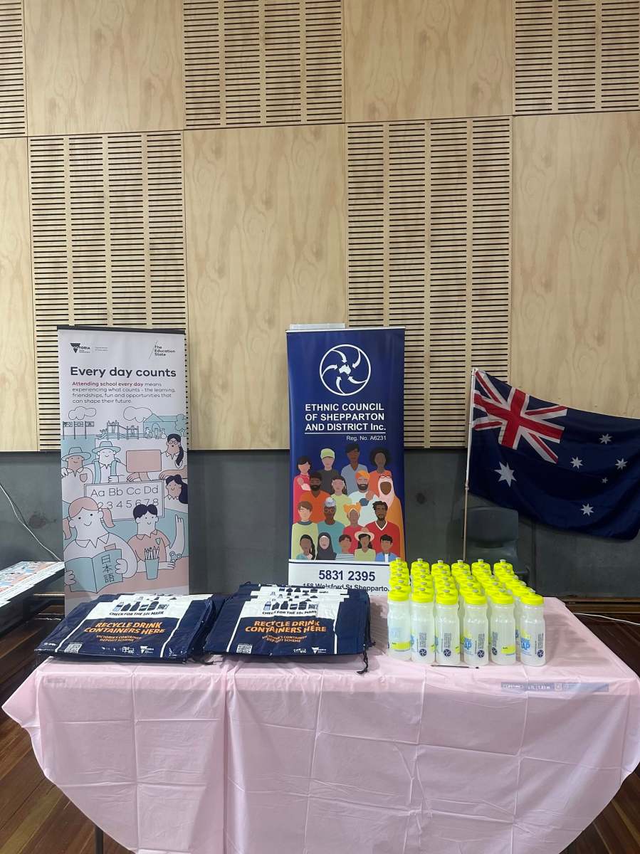 The Ethnic Council of Shepparton and District information stall with banners and resources.
