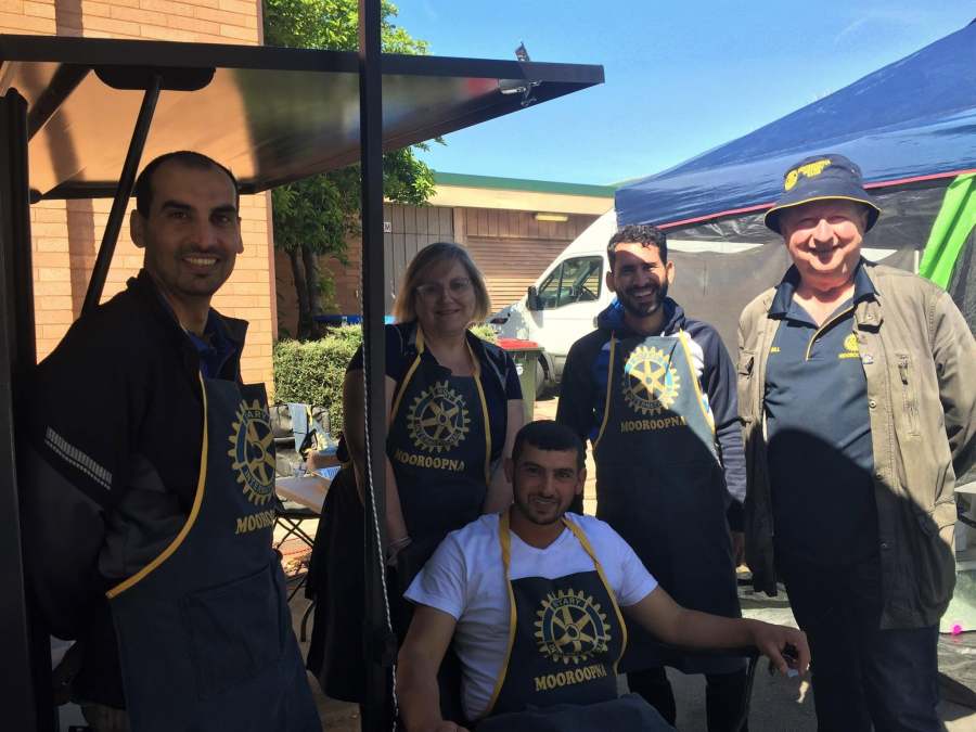 Rotary volunteers gathered beside the catering stall in October 2017.