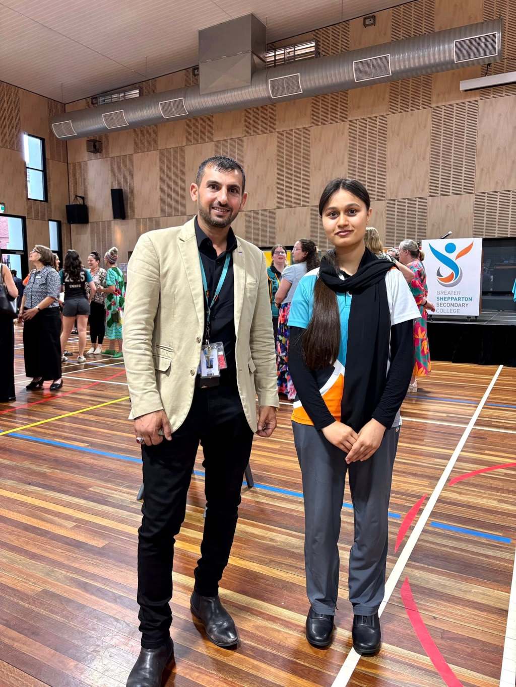 Hussam Saraf with a student in the GSSC hall during the awards evening.