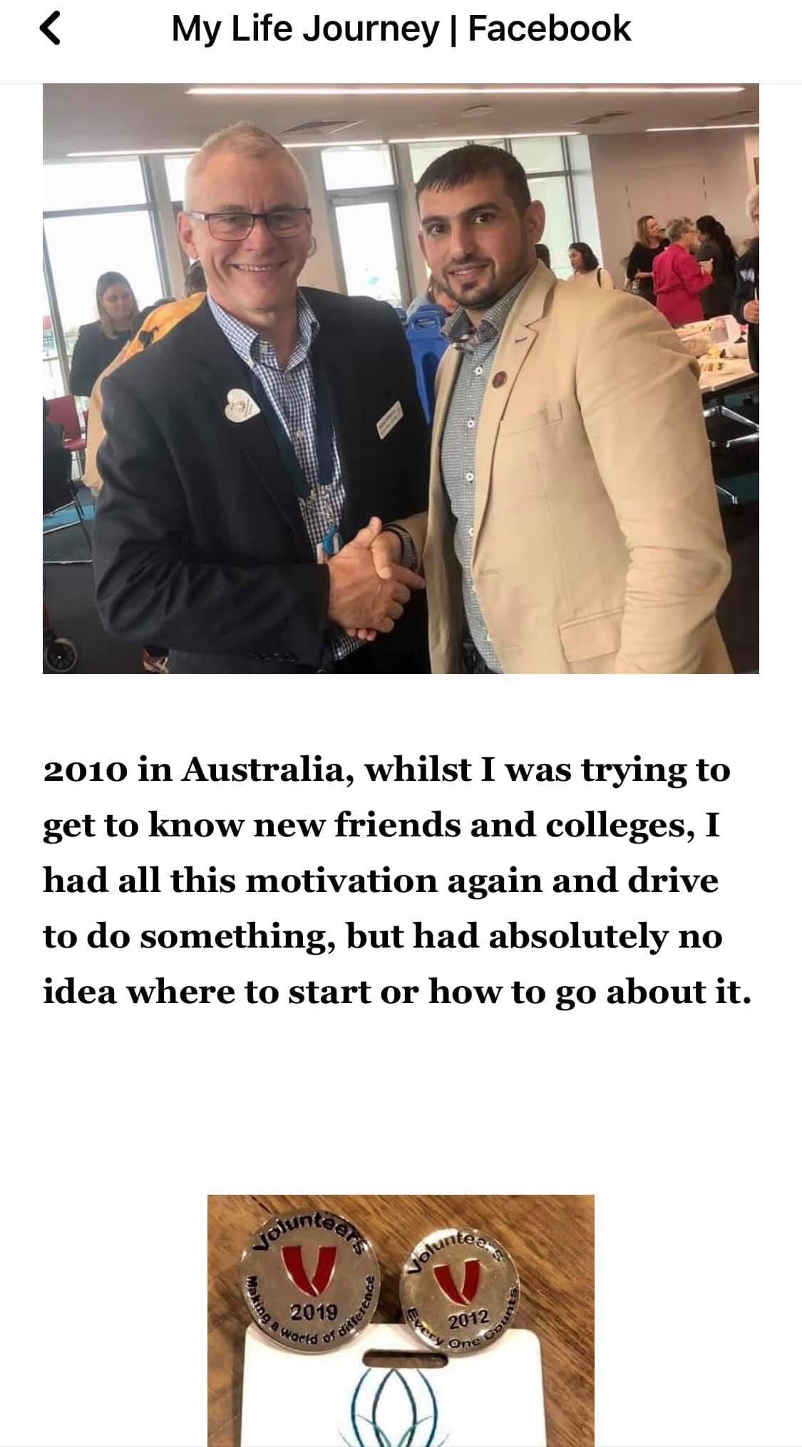 Hussam Saraf greeting another attendee at a community gathering.