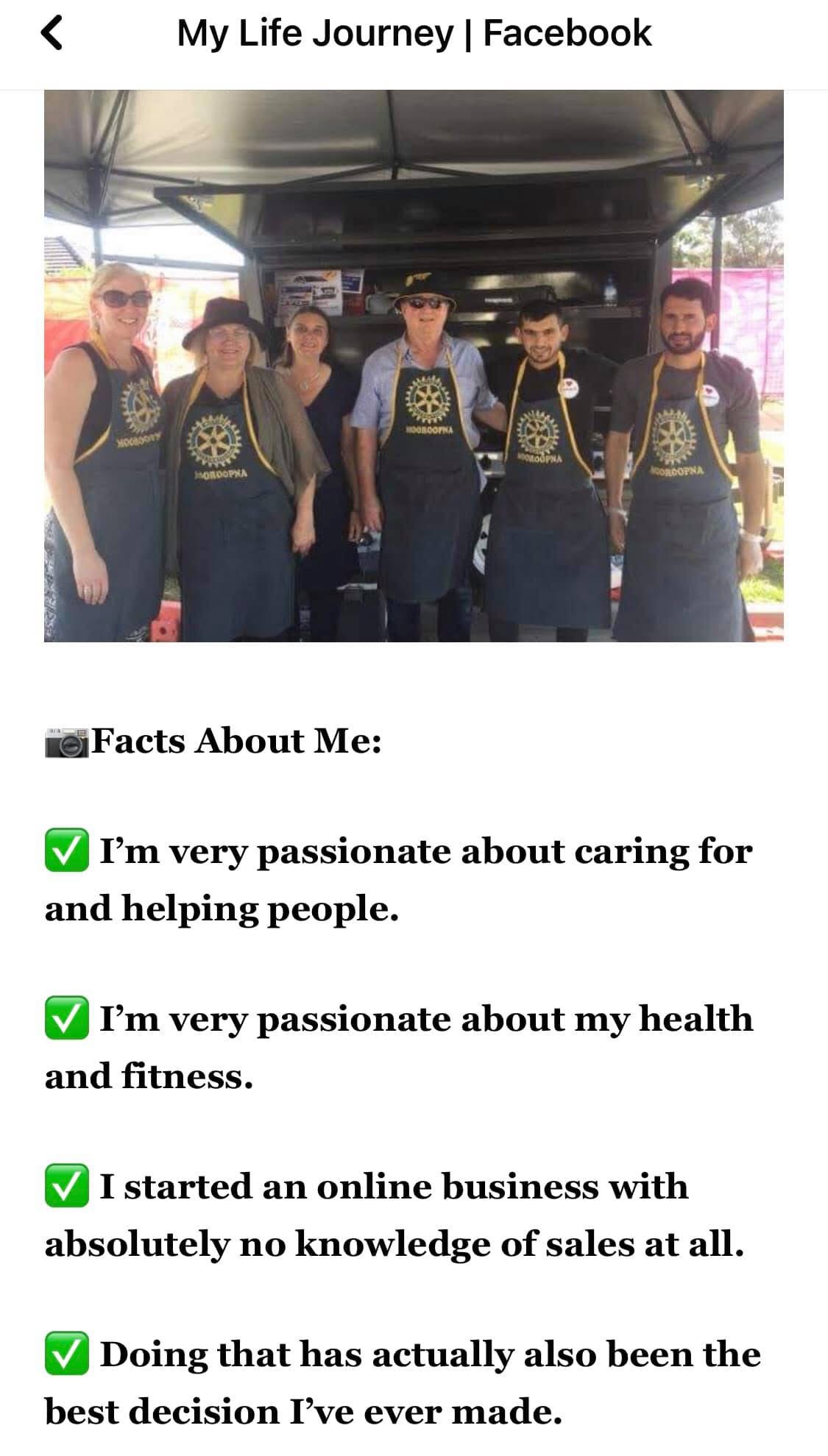 Hussam Saraf with a group wearing Rotary Mooroopna aprons at a catering trailer.