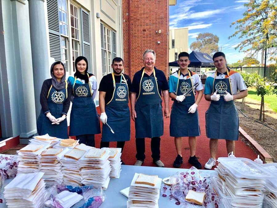 Kadir SUT, Hussam Saraf and fellow volunteers at the Year 5 Aspirations Day food table.