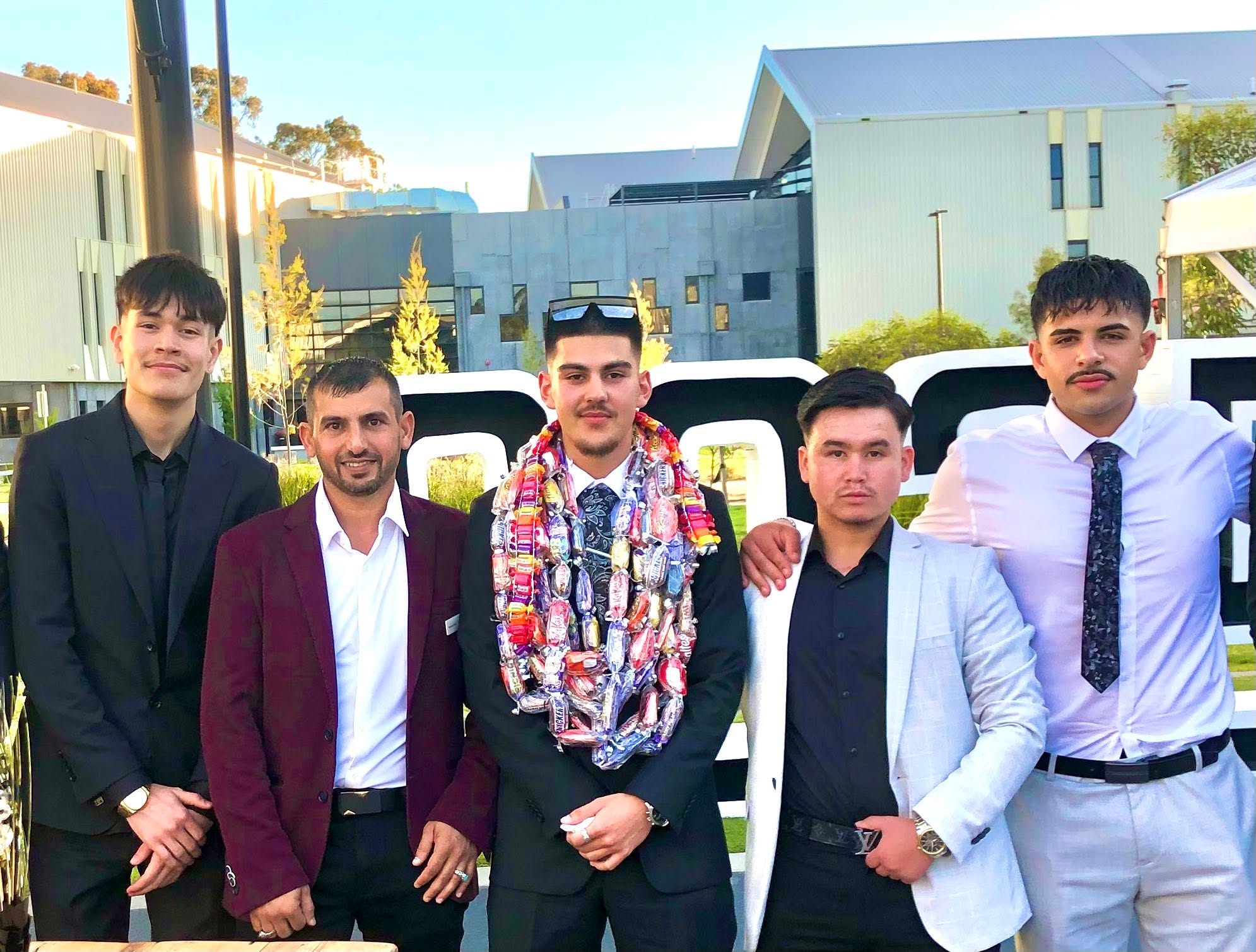 Kadir SUT with Hussam Saraf and fellow graduates at GSSC’s Class of 2025 celebration.