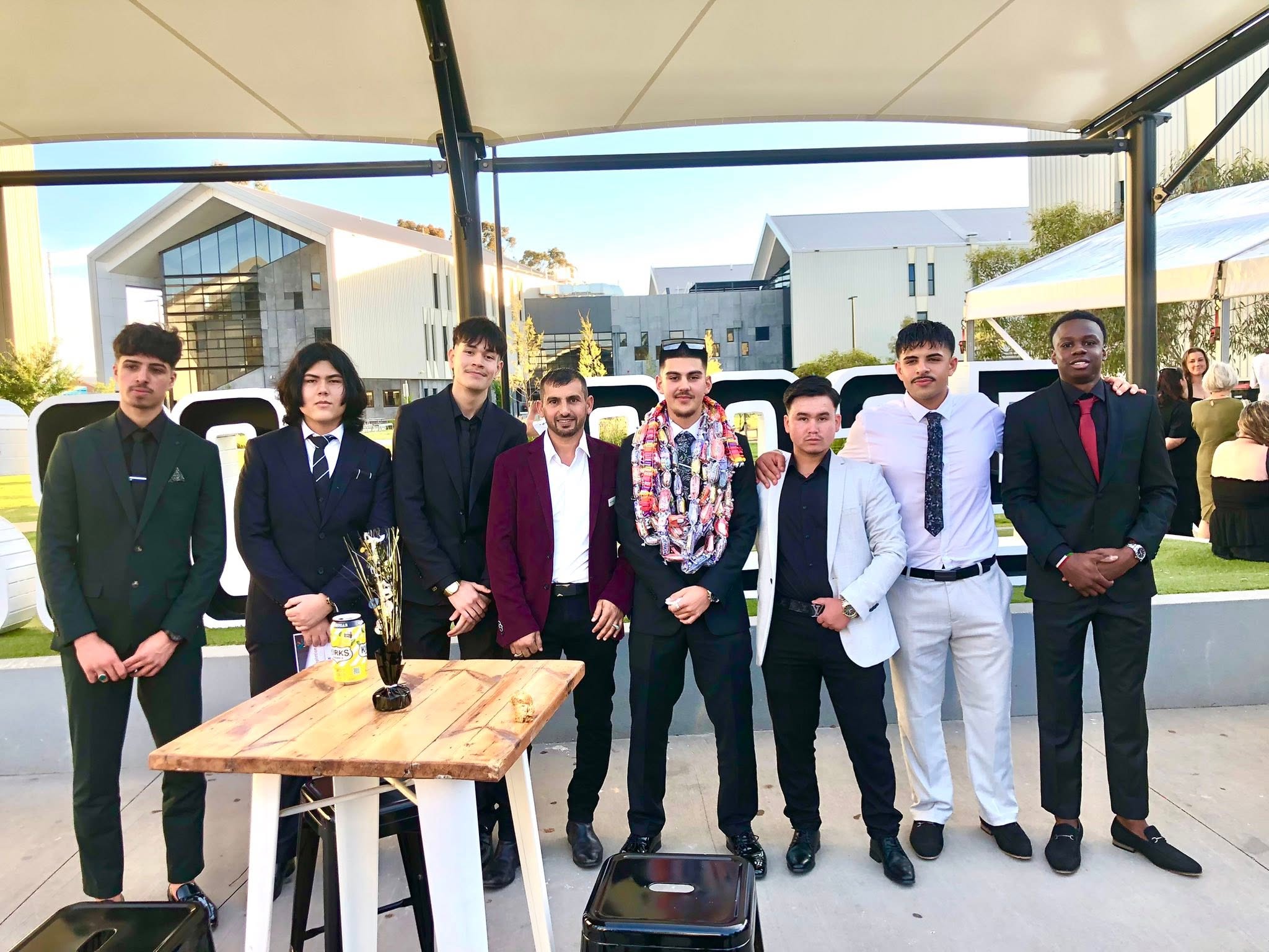 Kadir SUT, Hussam Saraf and a group of students celebrating GSSC’s Class of 2025.