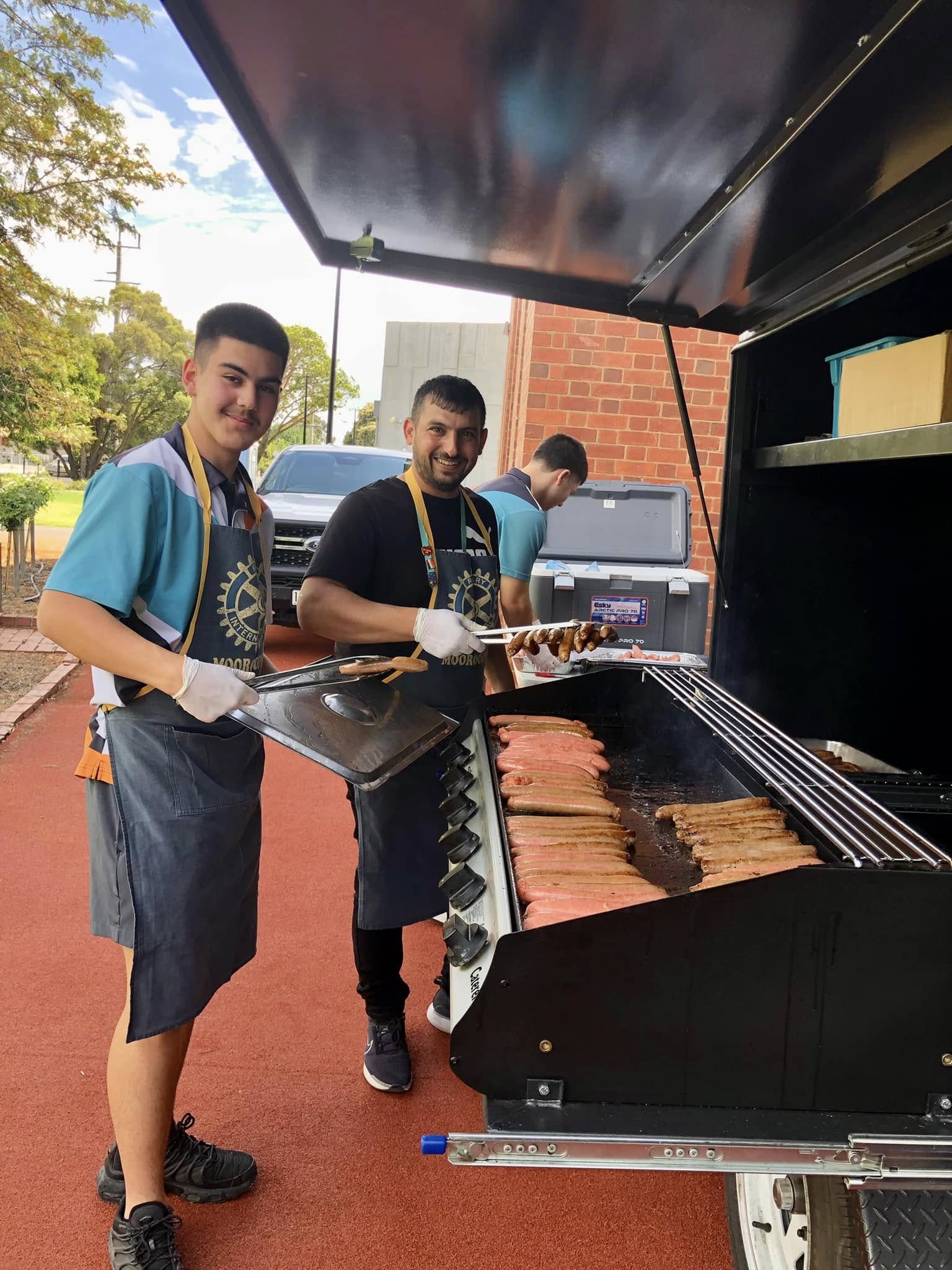 Kadir SUT and Hussam Saraf helping with the barbecue at GSSC Year 5 Aspirations Day.