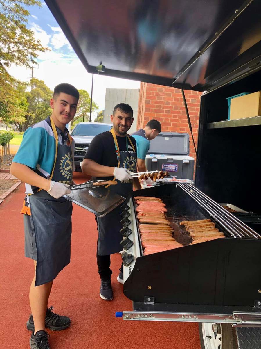 Kadir SUT and Hussam Saraf helping with the barbecue at GSSC Year 5 Aspirations Day.