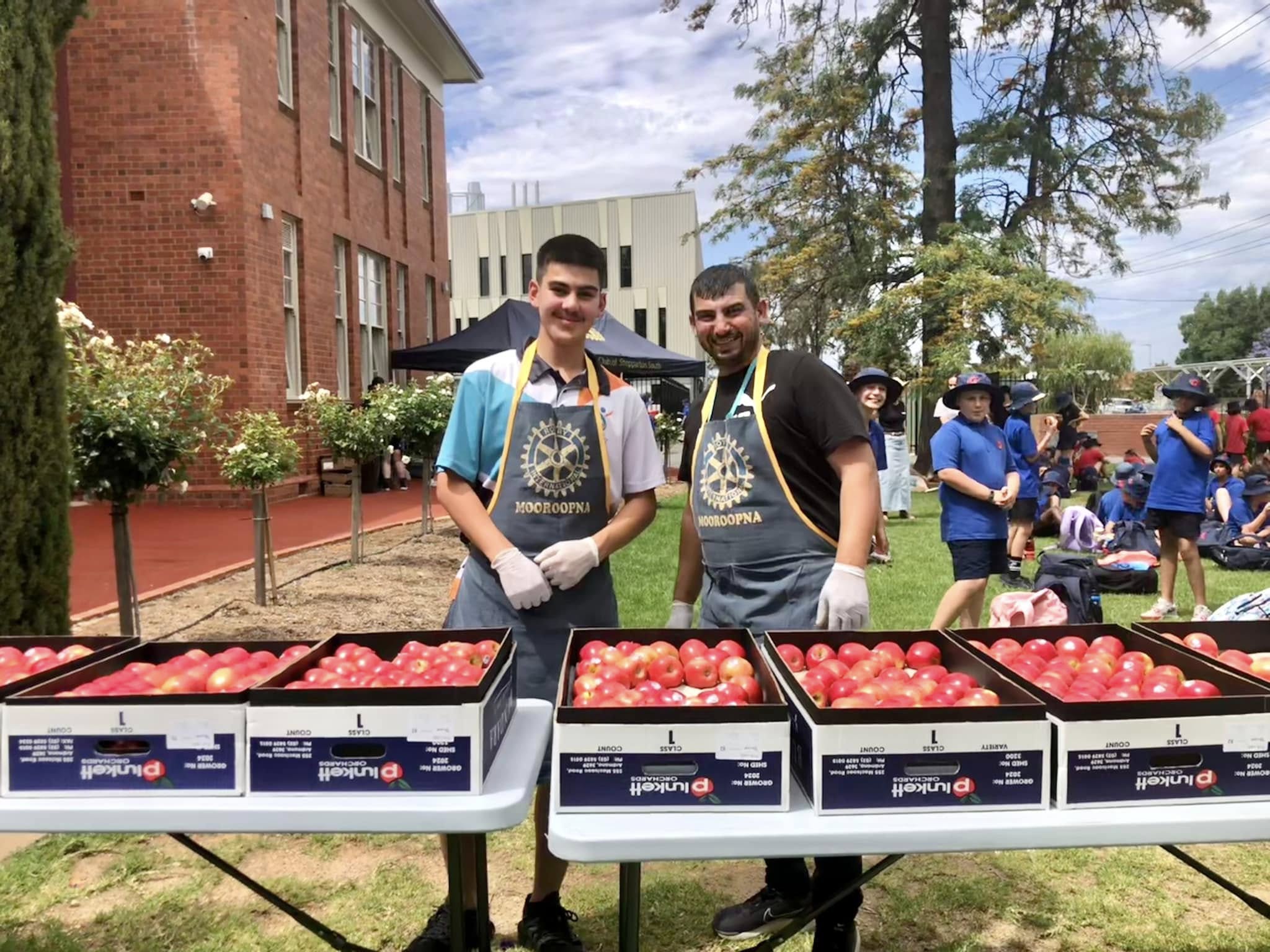 Kadir SUT and Hussam Saraf at the food table during GSSC Year 5 Aspirations Day.