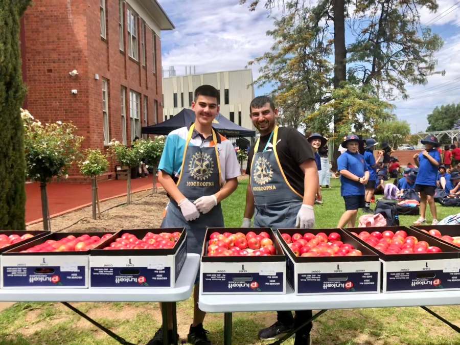 Kadir SUT and Hussam Saraf at the food table during GSSC Year 5 Aspirations Day.