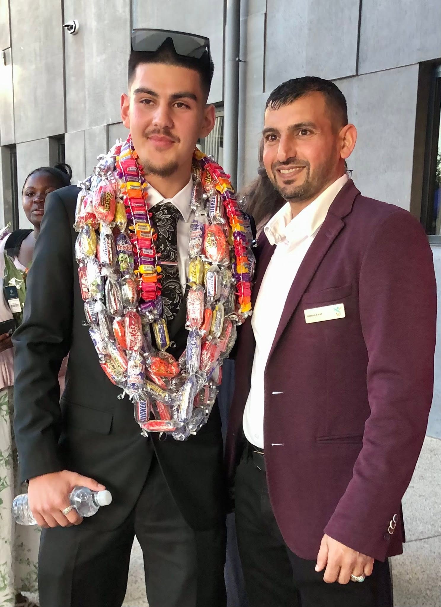 Kadir SUT with Hussam Saraf in a close-up photograph from the Class of 2025 graduation celebrations.