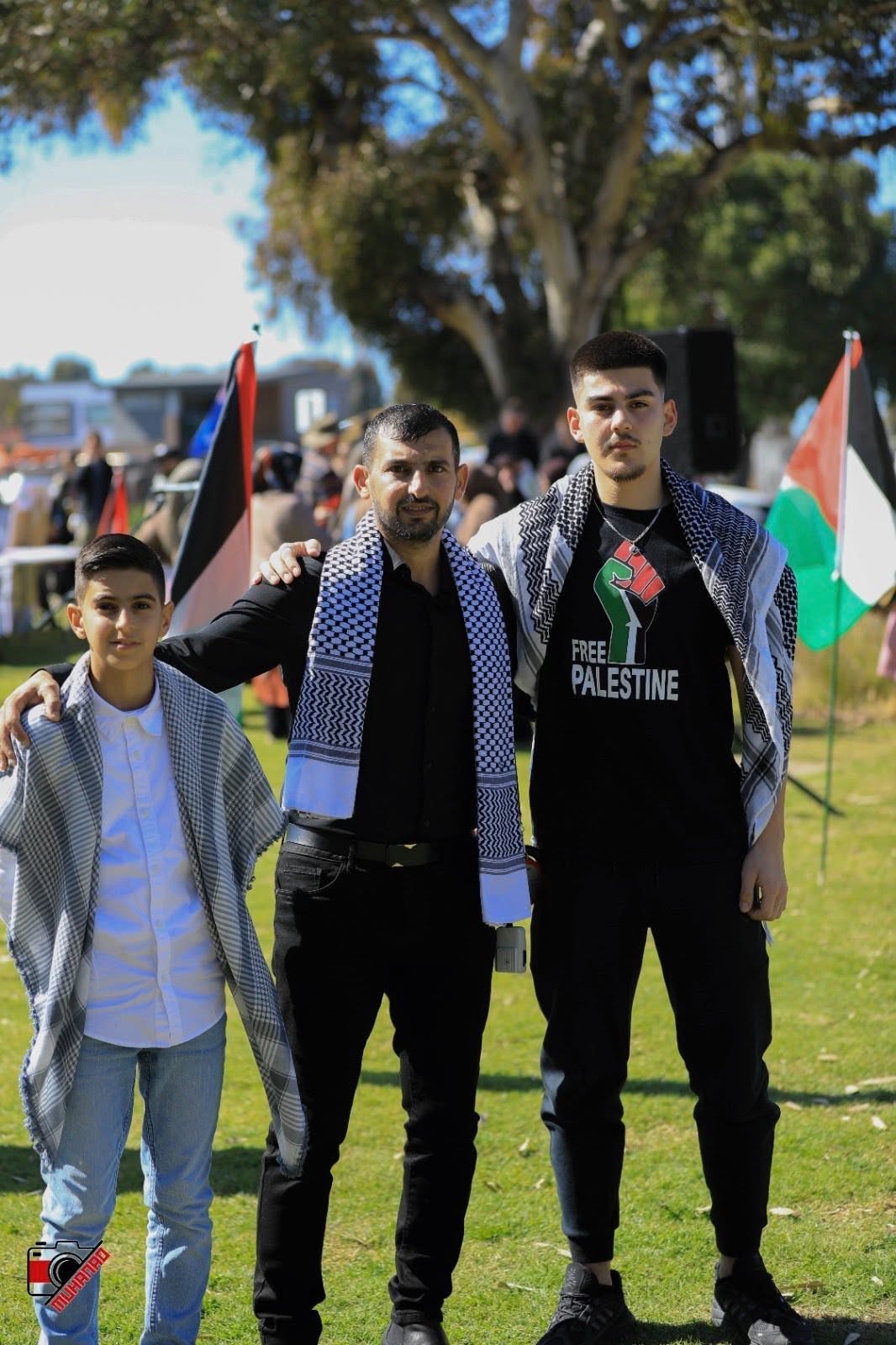 Kadir SUT and Hussam Saraf with a fellow participant at the march.
