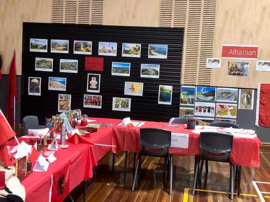 Photographic panels, flags and resources arranged at a language station.